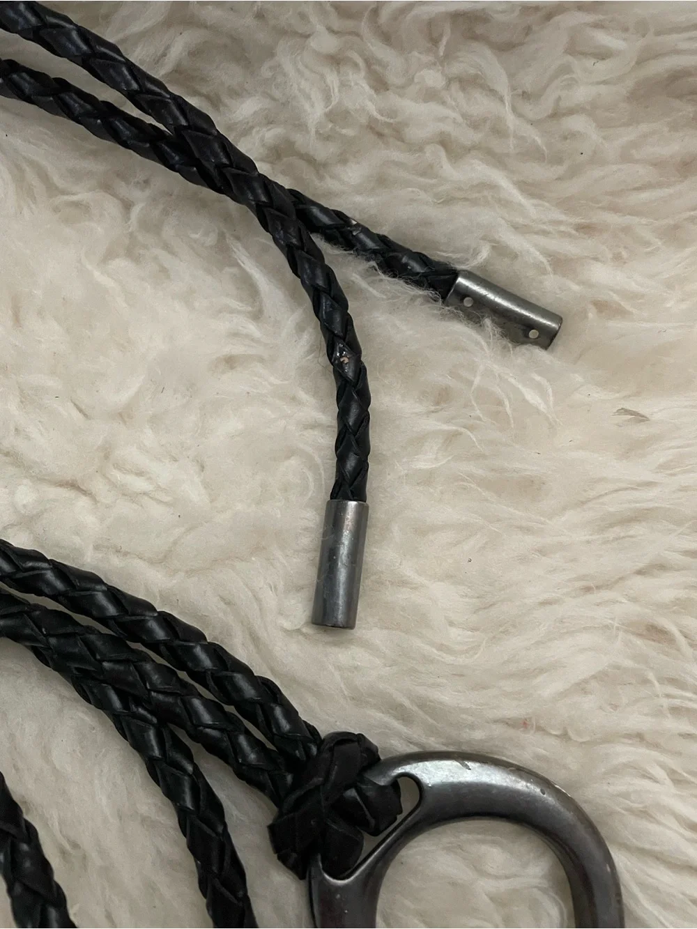 Braided black wrap around belt with a pewter ring buckle